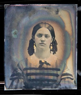 Tintype of young girl out of case