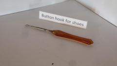 Button Hook, orange and off-white handle