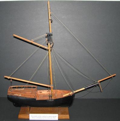 Ship model of the "Guilford" (a) and stand (b)