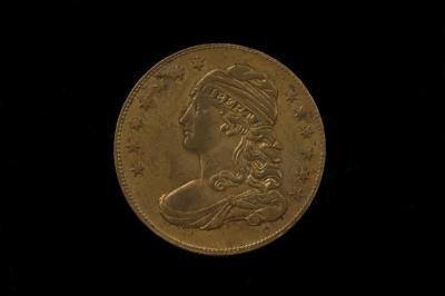 Physical object: Brass token with Lady Liberty and General Tom Thumb
