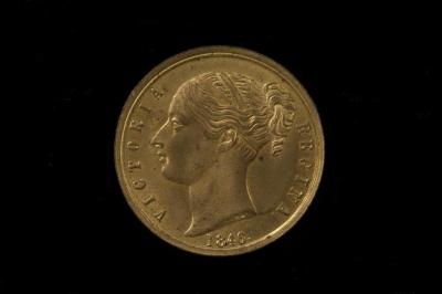 Physical object: Brass token with Queen Victoria and Charles S. Stratton