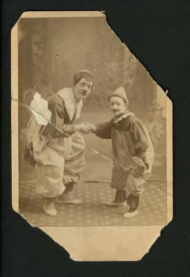 Photograph: Edwin "Eddie" Fritz Smith with older clown, circa 1887