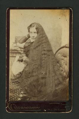 Photograph: Portrait of a woman with long hair, one of the Sutherland Sisters
