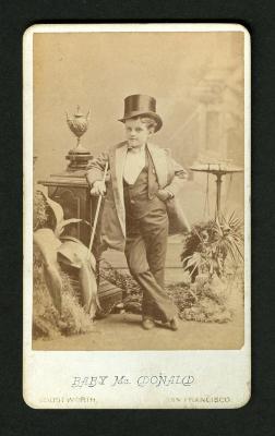 Photograph: Portrait of Baby McDonald in suit and top hat