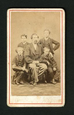 Photograph: Portrait of William Chantrell and group of his acrobats