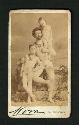 Photograph: Portrait of a boy, a man and a young girl