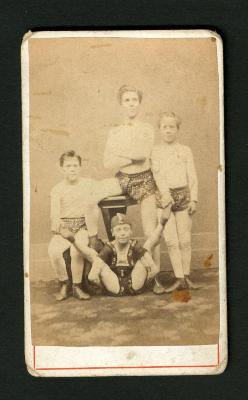 Photograph: Portrait of a group of Wm. Chantrell's acrobats - man and 3 children