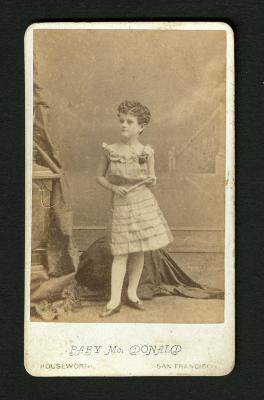 Photograph: Portrait of Baby McDonald in short dress