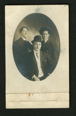 Photograph: Postcard photograph of three unidentified men