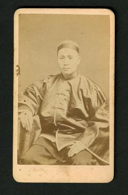 Photograph: Portrait bust of Asian man wearing non-Western clothing