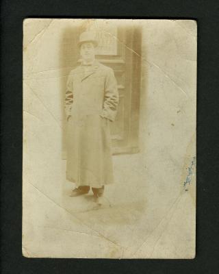 Postcard: Eddie F. Smith in hat and coat