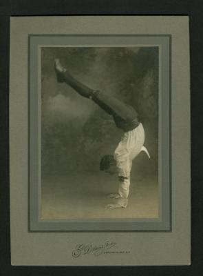 Photograph: Eddie F. Smith performing a handstand