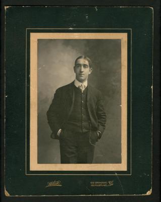 Photograph: Portrait of Eddie F. Smith, standing
