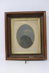 Framed photo of suited man