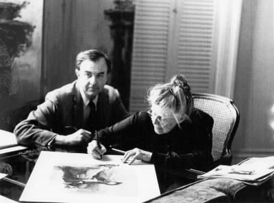 Photo of Everett Raymond Kinstler and Katharine Hepburn during print signing