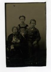 Tintype of Kate, Albert and Jennie Phelps