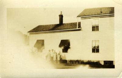 147 Pleasant Street, west view with family, 1933
