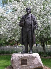 Henry Whitfield statue on pedestal