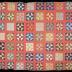 Multicolored shoo fly quilt
