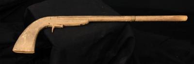Toy wooden gun