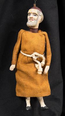 Monk doll front